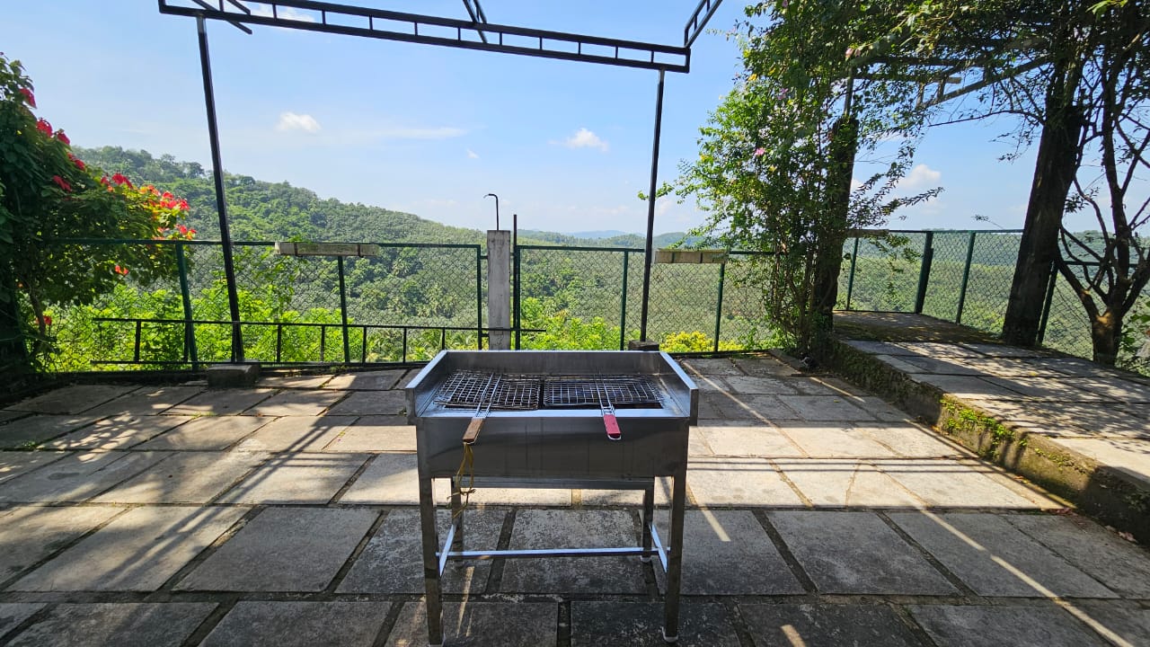 BBQ grill in the garden at Naz's Farm House in the evening