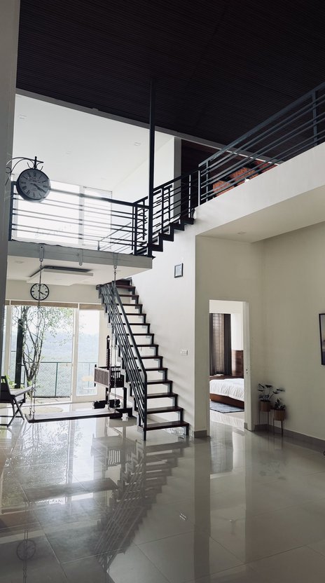The staircase and hall, seen from the ground floor